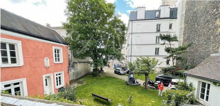 Grand appartement avec jardin en viager à Montmartre